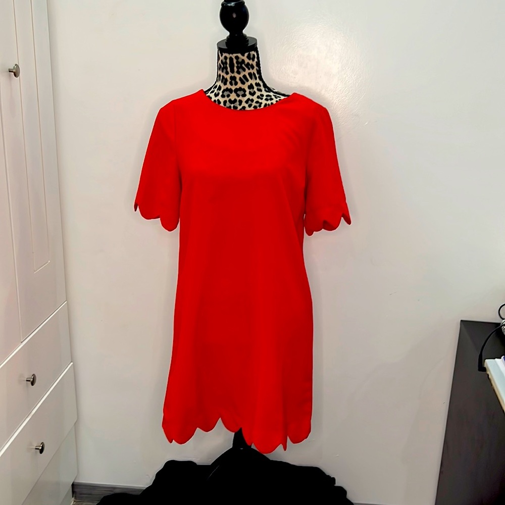 Red dress with scallop hem  and scallop sleeves
